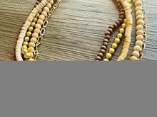 Load image into Gallery viewer, Gold & Brown statement necklace, chunky bib beaded jewelry 5 strand neutral necklace, wood multi strand wood, Traveler Collection