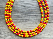 Load image into Gallery viewer, Cobblestone Harvest Chunky Rainbow Beaded Necklace, 3 Strand Colorful Jewelry statement necklace, wood big beaded necklace yellow red orange