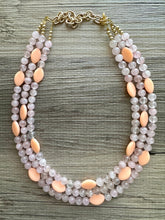 Load image into Gallery viewer, Rose Quartz & Cantelope statement necklace, chunky bib beaded jewelry soft blush pink necklace, multi strand cream peach 3 strand glass