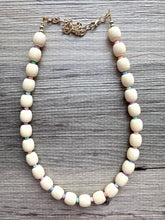Load image into Gallery viewer, Creamy Pastel Statement Necklace, single strand Geometric Beaded Jewelry, off white bib necklace, shell necklace, champagne