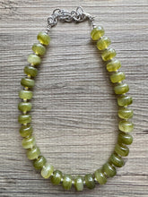 Load image into Gallery viewer, Olive Candy Statement Necklace, resin chunky multi-strand jewelry, deep army green necklace, single strand silver necklace thick layering