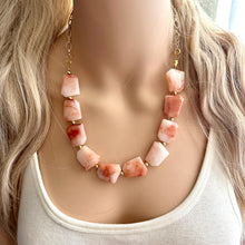Load image into Gallery viewer, Masai Mara chunky necklace, Wanderlust Collection beaded jewelry, resin beaded Ombré necklace, tan champagne coral peach