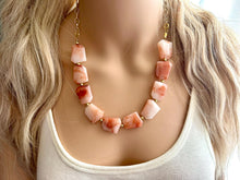 Load image into Gallery viewer, Masai Mara chunky necklace, Wanderlust Collection beaded jewelry, resin beaded Ombré necklace, tan champagne coral peach