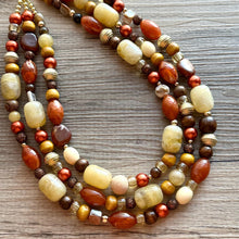 Load image into Gallery viewer, Bourbon & Espresso Chunky Necklace, dark brown bead necklace, 3 strand bib resin statement layering jewelry chocolate copper orange gold