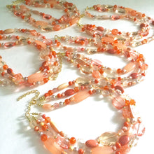 Load image into Gallery viewer, Peach and Coral Chunky Statement Necklace - Triple Strand Beaded Jewelry - peach coral jewelry -bridsmaid wedding