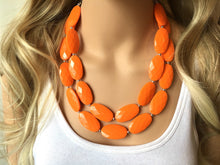 Load image into Gallery viewer, Orange Oval Chunky Statement Necklace, Big beaded bib jewelry, Double Strand Statement Necklace, geometric bright orange bridesmaid wedding