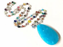 Load image into Gallery viewer, Caribbean Blue Pendant Necklace in Rainbow glass beaded chain, Long acrylic teardrop jewelry, necklace light blue jewelry pride colorful