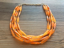 Load image into Gallery viewer, Textured Orange Statement Necklace, Big Beaded necklace, chunky orange necklace, fall wedding, orange jewelry, pumpkin jewelry halloween