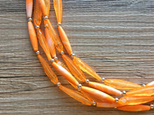 Load image into Gallery viewer, Textured Orange Statement Necklace, Big Beaded necklace, chunky orange necklace, fall wedding, orange jewelry, pumpkin jewelry halloween
