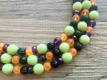 Load image into Gallery viewer, Fall Statement Necklace, green purple black Orange, Triple Strand Statement Necklace, fall colors, chunky autumn necklace, beaded