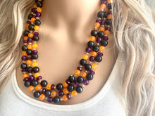 Load image into Gallery viewer, Fall Statement Necklace, purple black Orange, Triple Strand Statement Necklace, fall colors, chunky autumn necklace, champagne beaded