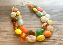Load image into Gallery viewer, Fall Pumpkins chunky necklace, brown beaded jewelry, resin beaded orange necklace, fall necklace, Halloween necklace tan champagne yellow