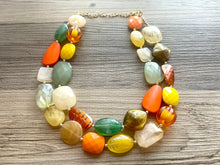 Load image into Gallery viewer, Fall Pumpkins chunky necklace, brown beaded jewelry, resin beaded orange necklace, fall necklace, Halloween necklace tan champagne yellow