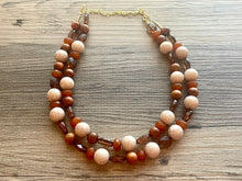 Load image into Gallery viewer, Fall Statement Necklace, brown double strand chunky jewelry, geometric acrylic beaded gold necklace, honey butter cream tortoise shell