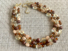 Load image into Gallery viewer, Drip Coffee Gold Chunky Statement Necklace, multi Strand Beaded Jewelry Champagne glass jewelry 3 strand chunky bib confetti fall necklace