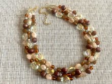 Load image into Gallery viewer, Drip Coffee Gold Chunky Statement Necklace, multi Strand Beaded Jewelry Champagne glass jewelry 3 strand chunky bib confetti fall necklace