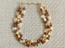 Load image into Gallery viewer, Drip Coffee Gold Chunky Statement Necklace, multi Strand Beaded Jewelry Champagne glass jewelry 3 strand chunky bib confetti fall necklace