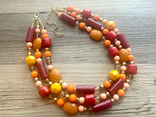 Load image into Gallery viewer, Crisp Fall Breeze Chunky Statement Necklace, Big beaded jewelry, multi strand Statement Earrings, chunky bib orange yellow mustard brown
