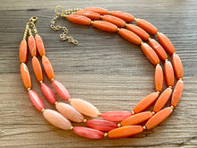 Load image into Gallery viewer, Clementine Sky Chunky 3 Strand Statement Necklace, Orange coral pink jewelry, orange color block statement, peach summer fall necklace