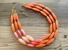 Load image into Gallery viewer, Clementine Sky Chunky 3 Strand Statement Necklace, Orange coral pink jewelry, orange color block statement, peach summer fall necklace