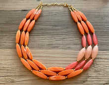 Load image into Gallery viewer, Clementine Sky Chunky 3 Strand Statement Necklace, Orange coral pink jewelry, orange color block statement, peach summer fall necklace