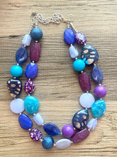Load image into Gallery viewer, Intergalactic Seascape Statement Necklace, chunky bib beaded jewelry, royal blue necklace, light aqua blue beaded purple jewelry