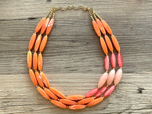 Load image into Gallery viewer, Clementine Sky Chunky 3 Strand Statement Necklace, Orange coral pink jewelry, orange color block statement, peach summer fall necklace