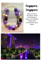 Load image into Gallery viewer, Singapore Neons chunky necklace, Wanderlust Collection beaded jewelry, resin beaded Ombré necklace, purple black gold resin