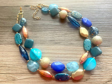 Load image into Gallery viewer, Sydney Skyline chunky necklace, Wanderlust Collection beaded jewelry, resin beaded Ombré necklace, blue copper gold turquoise aqua