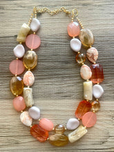 Load image into Gallery viewer, Masai Mara chunky necklace, Wanderlust Collection beaded jewelry, resin beaded Ombré necklace, tan champagne coral peach