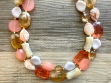Load image into Gallery viewer, Masai Mara chunky necklace, Wanderlust Collection beaded jewelry, resin beaded Ombré necklace, tan champagne coral peach