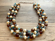 Load image into Gallery viewer, July Summer Storm Soirée, Chunky 3 Strand Statement Necklace, blue royal jewelry, silver necklace, resin cream jewelry metallic aqua brown