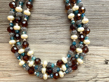 Load image into Gallery viewer, July Summer Storm Soirée, Chunky 3 Strand Statement Necklace, blue royal jewelry, silver necklace, resin cream jewelry metallic aqua brown