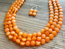 Load image into Gallery viewer, Orange Beaded Statement Necklace, beaded jewelry, orange jewelry, beaded necklace, orange earrings necklace, chunky bib