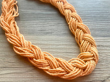 Load image into Gallery viewer, Braided Seed Bead Statement Necklace, Peach Orange long necklace, Chunky jewelry thick collar bib necklace, creamsicle beaded necklace