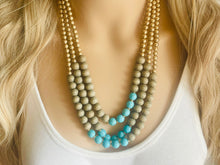 Load image into Gallery viewer, Blue turquoise statement necklace, chunky bib beaded jewelry light blue necklace, multi strand wood & gold, Traveler Collection