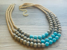 Load image into Gallery viewer, Blue turquoise statement necklace, chunky bib beaded jewelry light blue necklace, multi strand wood & gold, Traveler Collection