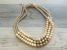 Load image into Gallery viewer, Brown Speckled statement necklace, chunky bib beaded jewelry chocolate necklace, multi strand wood & gold, Traveler Collection
