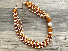 Load image into Gallery viewer, Orange & Cream Statement Necklace, 6 strand chunky long necklace, teal jewelry, warm orange white acrylic vintage beaded necklace