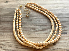 Load image into Gallery viewer, Birch Wood 3 Strand Beaded Necklace, vintage tan brown Jewelry Chunky statement necklace, big beaded necklace geometric boho