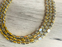 Load image into Gallery viewer, Gold Dipped beaded statement necklace, triple strand necklace, gray jewelry, glass jewelry, 3 chunky jewelry gray gold geometric statement