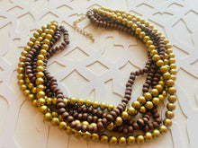 Load image into Gallery viewer, Gold & Brown statement necklace, chunky bib beaded jewelry 6 strand neutral necklace, wood multi strand wood, Traveler Collection metallic