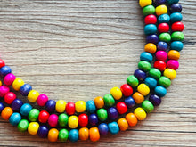 Load image into Gallery viewer, Cobblestone Chunky Rainbow Beaded Necklace, 3 Strand Colorful Jewelry statement necklace, wood big beaded necklace, rainbow jewelry baby