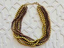 Load image into Gallery viewer, Gold & Brown statement necklace, chunky bib beaded jewelry 6 strand neutral necklace, wood multi strand wood, Traveler Collection metallic