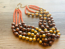 Load image into Gallery viewer, Coral Gold & Brown statement necklace, asymmetric chunky bib beaded jewelry 4 strand neutral, wood multi strand wood thick bib vintage