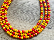 Load image into Gallery viewer, Cobblestone Harvest Chunky Rainbow Beaded Necklace, 3 Strand Colorful Jewelry statement necklace, wood big beaded necklace yellow red orange