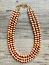 Load image into Gallery viewer, Pink & Gold Stardust statement necklace, chunky bib necklace, beaded jewelry blush pink necklace, three strand jewelry blush magenta light