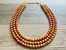 Load image into Gallery viewer, Pink & Gold Stardust statement necklace, chunky bib necklace, beaded jewelry blush pink necklace, three strand jewelry blush magenta light