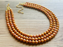 Load image into Gallery viewer, Pink & Gold Stardust statement necklace, chunky bib necklace, beaded jewelry blush pink necklace, three strand jewelry blush magenta light