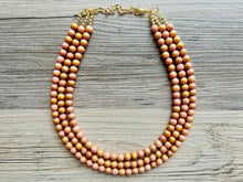 Load image into Gallery viewer, Pink & Gold Stardust statement necklace, chunky bib necklace, beaded jewelry blush pink necklace, three strand jewelry blush magenta light